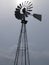 Dramatic Windmill Silhouetted in Dark Sky