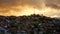 Dramatic yellow clouds over neighborhood in Comuna 13, Medellin Colombia