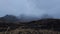 Dramatic zoom out timelapse Stokksnes black beach in South East Iceland. Dramatic cold rainy stormy day extreme conditions weather