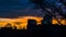 Dramatical sunset with city silhouettes