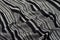 Draped black and white striped fabric texture