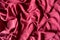 Draped bright ruby red cotton fabric