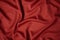 Draped dark red silky cloth