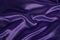 Draped dark violet satin silk background