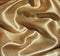 Draped gold satin background