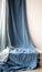 Draped muslin blue fabric cloth studio backdrop or background, suitable for use with portraits, products and concepts