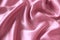 Draped pink satin background