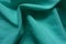 Draped thin bluish green chiffon fabric