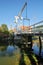 The drawbridge Kwakelbrug with historic houses and the Speeltoren Carillon Tower in the background, Edam