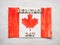 Drawing of the canadian flag and wooden letters