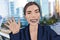 Drawing digital illustration of business woman saying hello to video camera taking selfie photo with smart phone app. Young