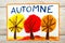 Drawing: French word Autumn and trees with red, yellow and orange leaves