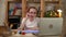 Drawing lesson online little girl joins video call on laptop Spbas