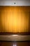 Drawn curtains with spotlight on performance stage