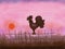 Drawn rooster with sunset or sunrise