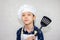 Dream careers concept, Portrait of Happy Kid chef looking at camera with blurred background