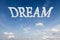 Dream concept text in clouds