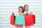 Dream of every girl shopping together with best friend. Girls children best friends hold bunch of shopping bags