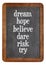 Dream, hope, believe, dare, risk try on balckboard