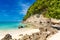 Dream scene. Beautiful palm trees above the white sand beach, th