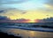 Dream of a sunset. Glorious golden and blue hues and a calm sea caressing the golden beach. Casuarina beach, Darwin, Australia.