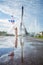 Dream travel - young woman with balloons walking near Eiffel Tower in Paris