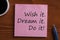 Dream it Wish it Do it written on note