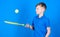 Dreaming about sport career. Athlete kid tennis racket on blue background. Tennis sport and entertainment. Boy child