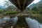 Dreaming under a bridge reflection