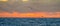 dreamlike sunset panorama on the open wide sea