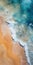 Dreamy Aerial Abstractions: Blue Water, Orange Sand, And Sea Water Splashes