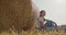 Dreamy Bliss, A Girl\'s Serene Life in the Field, Surrounded by Hay