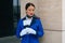 The dreamy flight attendant closed her eyes in her uniform. A flight attendant in white gloves holds a passport, a boarding pass