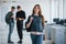 Dreamy look. Group of young people walking in the office at their break time