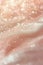 A dreamy, soft-focus close-up of sparkling particles in blush pink, perfect for cosmetic backgrounds, festive occasions