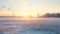 Dreamy Sunrise Over Icy Field: Scenic Winter Landscape In Rural Finland