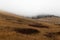 Dreary, foggy, empty, and barren winter landscape at the National Bison Range wildlife refuge, Montana, USA