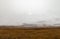 Dreary, foggy, empty, and barren winter landscape at the National Bison Range wildlife refuge, Montana, USA