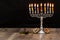 Dreidels and a menorah. Hanukkah. Text-Israel