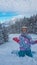 Dreilaendereck - Snowboard woman playing in deep powder snow in ski resort Dreilaendereck in Karawanks, Carinthia