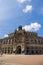 Dresden, Germany - June 28, 2022: Entrance portal to the Dresden Semperoper. Flanked by statues of the composers Goethe and