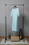 Dress on hangers on garment rack