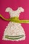 Dress shape made from oatmeal with measuring tape