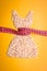 Dress shape made from oatmeal with measuring tape