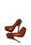 Dressed shoes on the platform with a bow on a high thin heel. Shoes. Orange