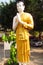 Dressed in yellow buddha statue