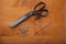 Dressmaker shears with tailor tools and needles craft concept on