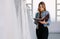 Dressmaker working in bridal clothing store