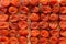 Dried apricots, dried fruits, on the market counter. Top view.