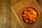 Dried apricots, place for lettering. wooden table, rustic style.